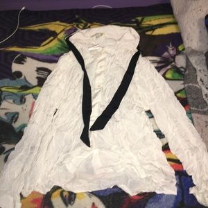 White button down shirt with black wrap on caller
